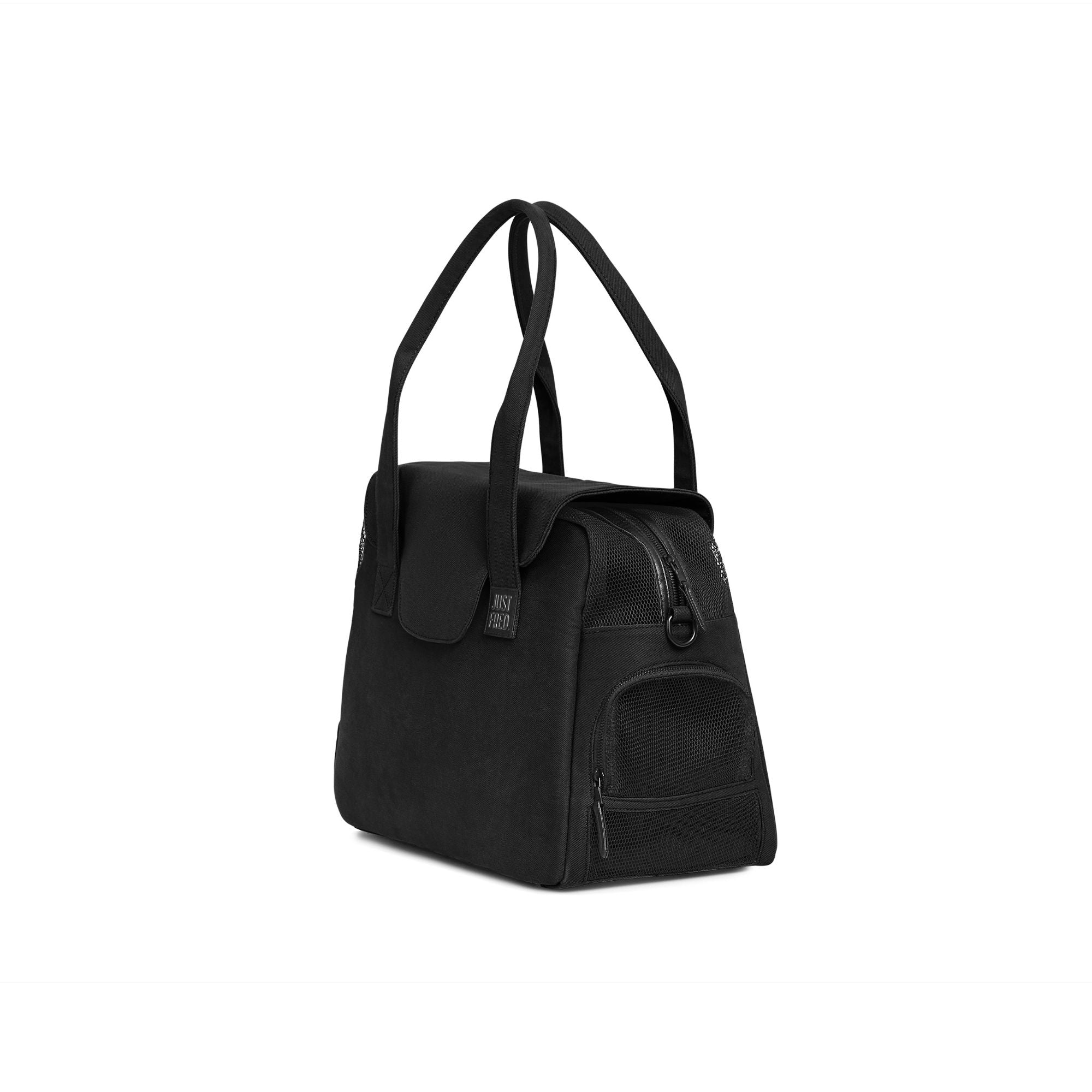 Black Just Fred Destination Tote pet dog carrier showing a breathable mesh window with a visible brand label on a white background