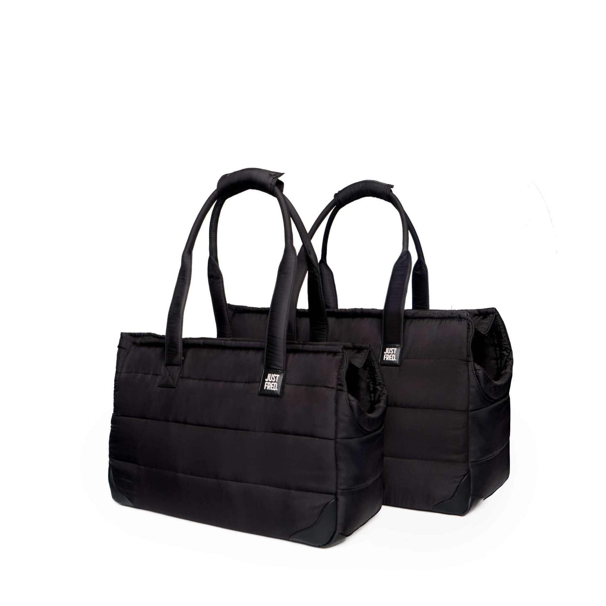 Two black Just Fred Subway tote dog carrier bags in size large and small on a white background