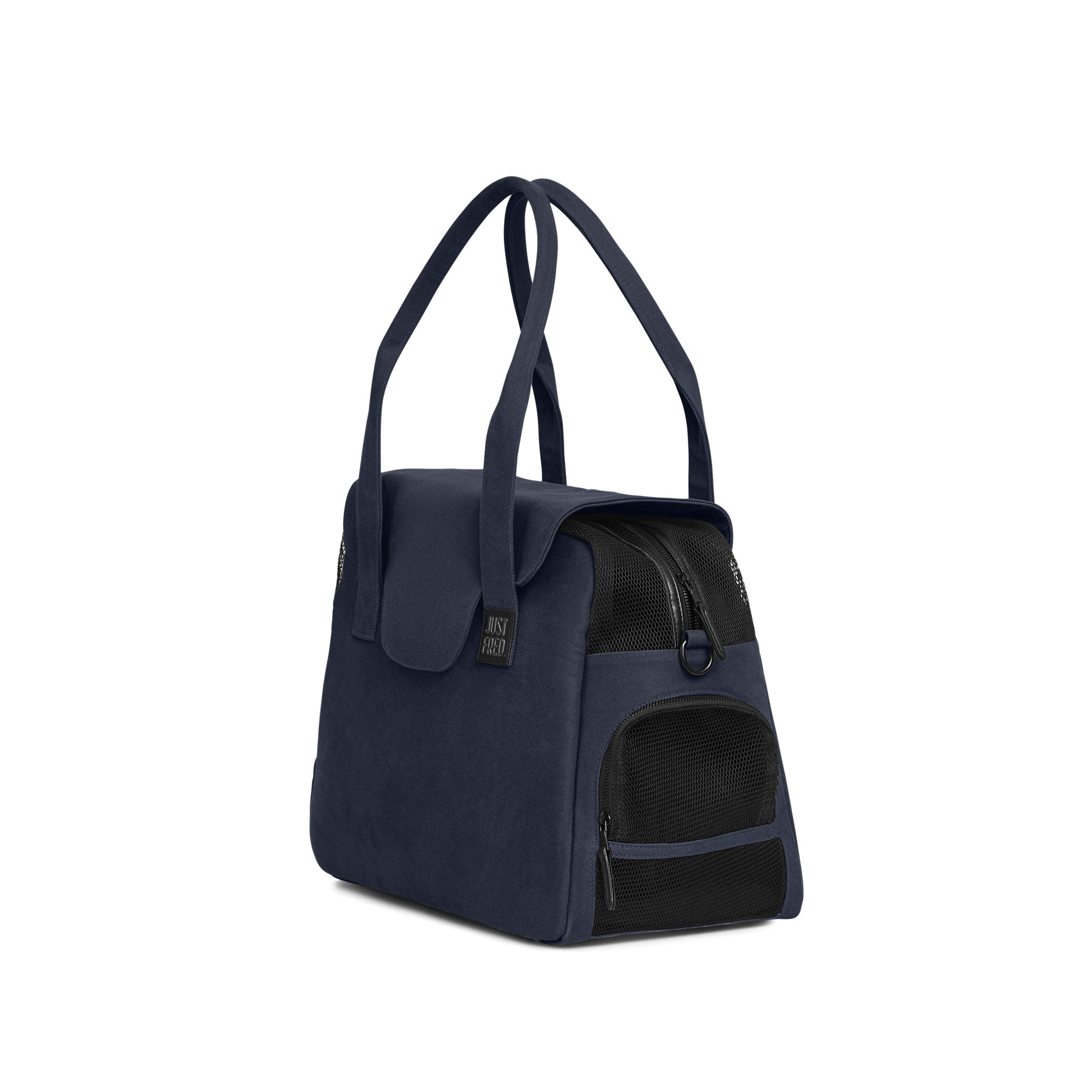 A navy-colored Just Fred Destination Dog Tote with a breathable mesh enclosure and an exterior peek-a-boo window, featuring dual handles and a vegan leather base, on a white background