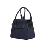 A navy-colored Just Fred Destination Dog Tote with a breathable mesh enclosure and an exterior peek-a-boo window, featuring dual handles, back zipped pocket and a vegan leather base, on a white background