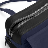 Navy Just Fred Destination Tote pet dog carrier shown from above to show the zip top opening and breathable mesh panels, and side mesh window, on a white background