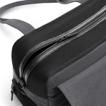 Gray Just Fred Destination Tote pet dog carrier zoomed into the top zipped panel featuring breathable mesh top and side window, on a white background