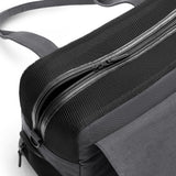 Gray Just Fred Destination Tote pet dog carrier zoomed into the top zipped panel featuring breathable mesh top and side window, on a white background